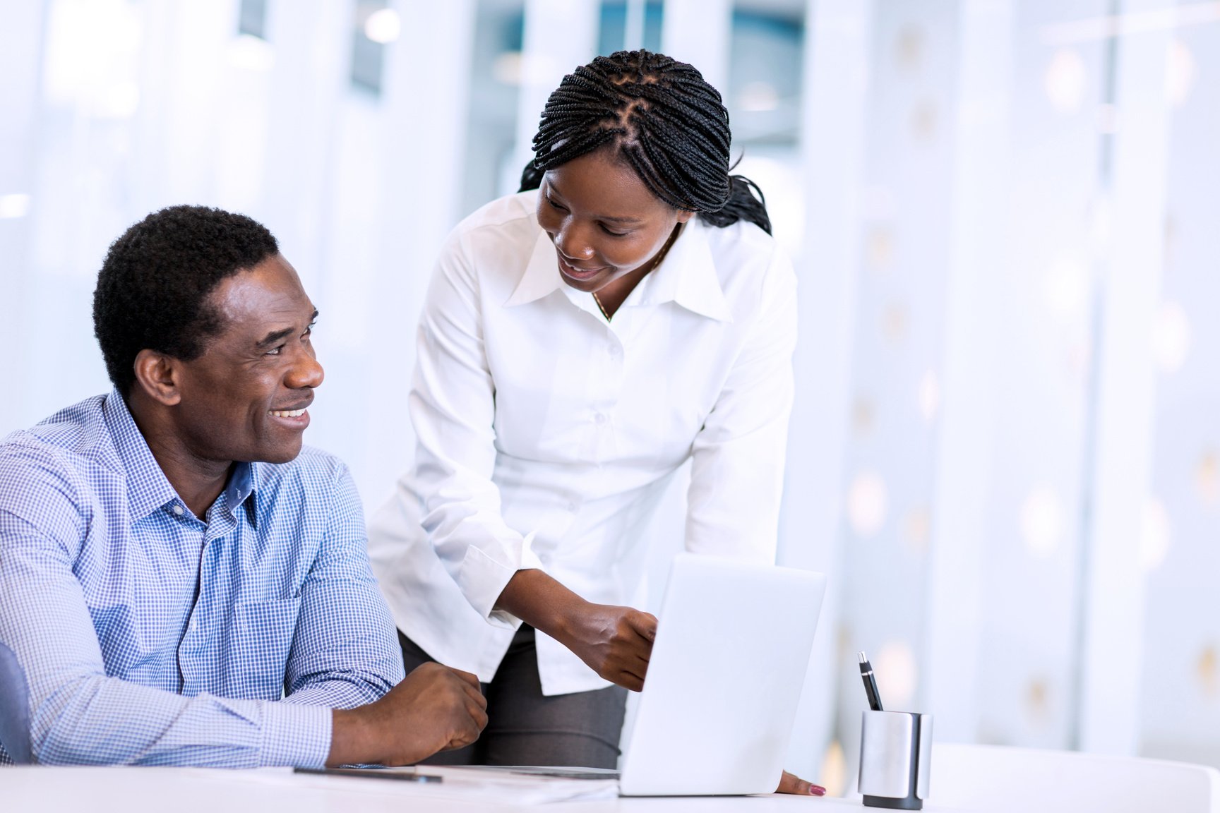 African American business people using computer.